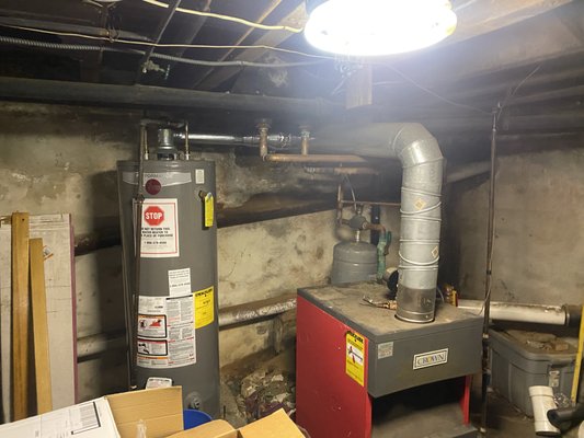 We turned an old inefficient oil boiler and gas water heater into a High Efficient combination tankless system - This was done because the customer did not want to have an old inefficient oil system. This was eligible for an energy rebate. Our customer now enjoys energy savings that will soon surpass the cost of this install We turned an old inefficient oil boiler and gas water heater into a High Efficient combination tankless system - This was done because the customer did not want to have an old inefficient oil system. This was eligible for an energy rebate. Our customer now enjoys energy savings that will soon surpass the cost of this install