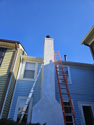 Chimney Repair - The chimney top plate was oxidized and bleeding onto the exterior masonry. We replaced the top plate and cap. We thoro-sealed the entire chimney and repaired flashing, soffits, and J-channel along the siding on both sides. Lastly, we repitched and releveled gutters. Chimney Repair - The chimney top plate was oxidized and bleeding onto the exterior masonry. We replaced the top plate and cap. We thoro-sealed the entire chimney and repaired flashing, soffits, and J-channel along the siding on both sides. Lastly, we repitched and releveled gutters.