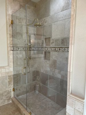 Shower Door upgrade - This shower glass upgrade featured double notched glass and gold hardware, Shower Door upgrade - This shower glass upgrade featured double notched glass and gold hardware,