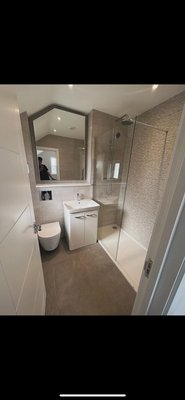 Complete Bathroom Renovation - This was a complete bathroom renovation. We removed the old fixtures and finishes, installed new floor and wall tiles, added a modern vanity and toilet, and built a sleek walk-in shower with a glass enclosure. The result is a bright, clean, and modern bathroom that combines functionality with elegant design. Complete Bathroom Renovation - This was a complete bathroom renovation. We removed the old fixtures and finishes, installed new floor and wall tiles, added a modern vanity and toilet, and built a sleek walk-in shower with a glass enclosure. The result is a bright, clean, and modern bathroom that combines functionality with elegant design.