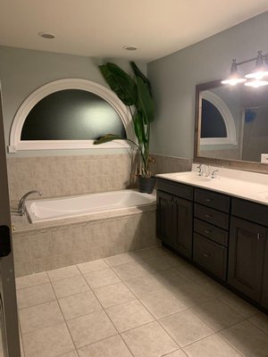Master Bathroom Remodel 2021 - This remodel was done to a bathroom that was very dated. My client wanted a modern bathroom that would satisfy them. The bathroom remodel took me 2 weeks to complete and it included new tile installation, a free standing tub, and a new double sink vanity. My client was very impressed by the quality of my work and the effort I put into this bathroom remodel. Master Bathroom Remodel 2021 - This remodel was done to a bathroom that was very dated. My client wanted a modern bathroom that would satisfy them. The bathroom remodel took me 2 weeks to complete and it included new tile installation, a free standing tub, and a new double sink vanity. My client was very impressed by the quality of my work and the effort I put into this bathroom remodel.