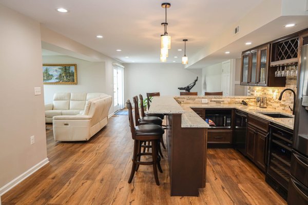 Basement Remodel - This basement remodel included the addition of a bar, recreational area, and movie theater Basement Remodel - This basement remodel included the addition of a bar, recreational area, and movie theater