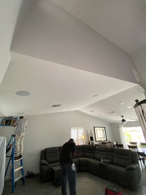 7.2.2 speaker retro fit and Tv install above fireplace - This installation started out as a custom TV install above a fireplace with a LeGrand in wall recessed box. With the help from our electricians and drywall repair we installed the 65” Samsung TV Above the fireplace with no cords in sight.
Phase 2 of this project was a retrofit of ceiling speakers to connect to his front tower speakers, subs, and receiver.
Our client was a Star Wars fan so we specially tuned this 7.2.2 system for watching movies and measured distances and decibel levels for an immersive outstanding experience . 7.2.2 speaker retro fit and Tv install above fireplace - This installation started out as a custom TV install above a fireplace with a LeGrand in wall recessed box. With the help from our electricians and drywall repair we installed the 65” Samsung TV Above the fireplace with no cords in sight.
Phase 2 of this project was a retrofit of ceiling speakers to connect to his front tower speakers, subs, and receiver.
Our client was a Star Wars fan so we specially tuned this 7.2.2 system for watching movies and measured distances and decibel levels for an immersive outstanding experience .