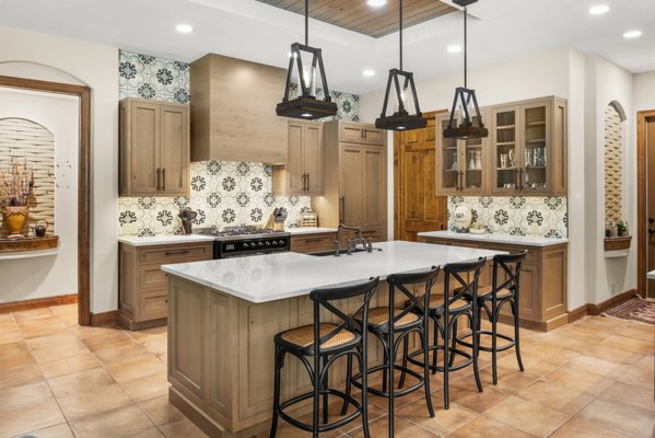 Warm Wood Kitchen Remodel - This Tampa kitchen got a gorgeous makeover full of warm wood, pops of pattern and industrial elements.