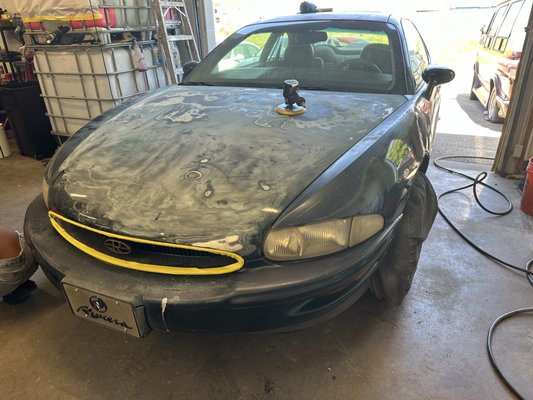 Let’s Redo The Rivi - Repairing dents, restoring paint from this really bad paint peeling 1998 Riviera. We created a paint colort hat was a green and  gold metallic pearl blend. This customer decided to go with our lead on suggestives for this Repair & Paint color, needless to say he was more than happy and very much, so satisfied. Another great job done by the outstanding technicians & painters , @ Hometown Customs  2. Good job guys.