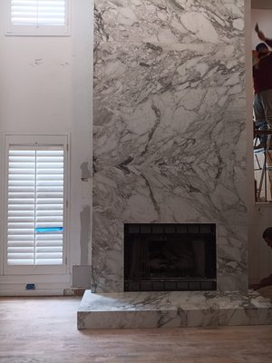 Project in the past month - This chimney had to be demolished and we went and replace it with some exotic marble great choice from customer Project in the past month - This chimney had to be demolished and we went and replace it with some exotic marble great choice from customer