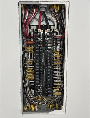 Panel Upgrades & Electrical Service Improvements - Residential electrical panel upgrades completed with organized wiring, labeled circuits, modern breakers, and clean code-conscious workmanship.