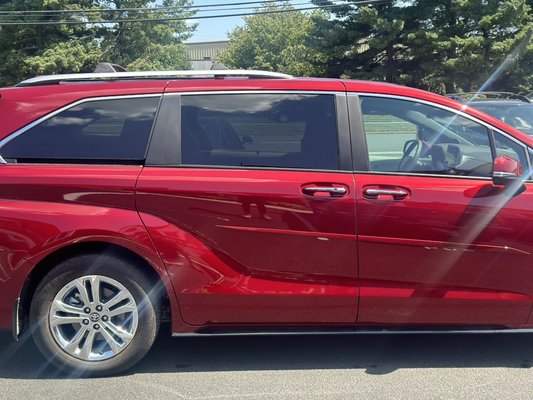 Ceramic Window Film Application - This is a Ceramic Window Film Installation at 70%. The 70% film does not change the pigment of the glass but the film itself still provides maximum heat rejection. If your main focus is to keep the inside of your vehicle a little cooler but don’t want to change the shade of your windows, this is the best option!