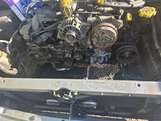 2004 Subaru Legacy diag and timing belt service - This older Subaru Legacy developed a loud knocking sound at idle, which was a clear cause for concern. We diagnosed the vehicle, and much to the customer's satisfaction, it was not the engine failing but the timing belt tensioner. We were able to install a new timing kit with a water pump and get this Subaru back on the road for miles to come 2004 Subaru Legacy diag and timing belt service - This older Subaru Legacy developed a loud knocking sound at idle, which was a clear cause for concern. We diagnosed the vehicle, and much to the customer's satisfaction, it was not the engine failing but the timing belt tensioner. We were able to install a new timing kit with a water pump and get this Subaru back on the road for miles to come
