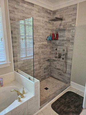 Shower remodel 2025 - This remodel was done on an old basic shower, to turn it into a beautiful tiled, open shower. Shower remodel 2025 - This remodel was done on an old basic shower, to turn it into a beautiful tiled, open shower.