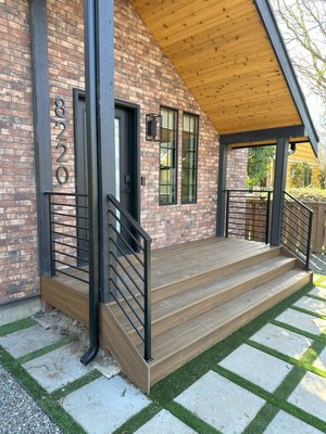 Porch Patio / Deck Sunshade - Transform your outdoor living experience with our latest deck construction featuring a sleek Trax deck, elegant metal railing, and a practical sunshade, all crafted with precision and style by Stellar Decking.
Premium Trax Decking: The heart of your new outdoor space is the Trax deck, renowned for its durability and low-maintenance benefits.
Sophisticated Metal Railing: The front porch is elegantly framed with contemporary metal railing, providing a chic and modern touch to your home’s exterior.
Versatile Sunshade: Enjoy comfort and protection from the sun with a stylish sunshade in the backyard.
Modern Aesthetics: Combining the contemporary look of Trax decking with the sleek lines of metal railing and the practical design of the sunshade. Porch Patio / Deck Sunshade - Transform your outdoor living experience with our latest deck construction featuring a sleek Trax deck, elegant metal railing, and a practical sunshade, all crafted with precision and style by Stellar Decking.
Premium Trax Decking: The heart of your new outdoor space is the Trax deck, renowned for its durability and low-maintenance benefits.
Sophisticated Metal Railing: The front porch is elegantly framed with contemporary metal railing, providing a chic and modern touch to your home’s exterior.
Versatile Sunshade: Enjoy comfort and protection from the sun with a stylish sunshade in the backyard.
Modern Aesthetics: Combining the contemporary look of Trax decking with the sleek lines of metal railing and the practical design of the sunshade.