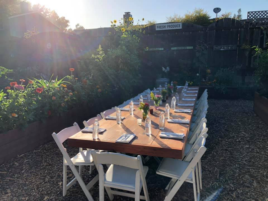 THE FARM TABLE - Huge redwood Farm Table hand-built, located in the middle of the organic vegetable garden.