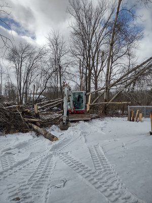 sand lake barn prep - customer wants to add a pole building in this back area. I installed a drain culvert and fill for a in a ditch that drains their backyard. ripping out the under brush and small trees. cleaning up storm damage as well. sand lake barn prep - customer wants to add a pole building in this back area. I installed a drain culvert and fill for a in a ditch that drains their backyard. ripping out the under brush and small trees. cleaning up storm damage as well.
