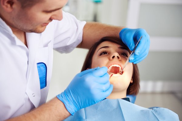 Dental Crowns & Bridges - A dental crown is used to restore the appearance and functionality of a tooth. It is crafted from porcelain and looks like a natural tooth. The permanent dental crown can be placed over the tooth once the tooth has been prepared. The crown is bonded on and can be used in any way a natural tooth would function.