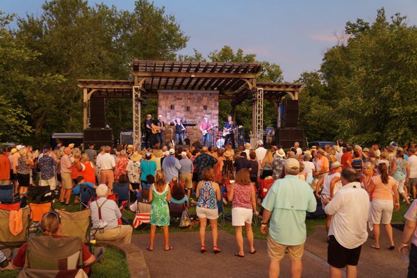 Live Music - The 6 acre terraced amphitheatre was built in early 2004 to accommodate larger national artist acts such as Mary Chapin Carpenter, Wynonna, Juice Newton, Exile and many others. It overlooks a beautiful horse farm and the scenic South Elkhorn Creek for gorgeous outdoor ambience. The terraces provide seating for everyone to enjoy shows and mingle with ample space. Live Music - The 6 acre terraced amphitheatre was built in early 2004 to accommodate larger national artist acts such as Mary Chapin Carpenter, Wynonna, Juice Newton, Exile and many others. It overlooks a beautiful horse farm and the scenic South Elkhorn Creek for gorgeous outdoor ambience. The terraces provide seating for everyone to enjoy shows and mingle with ample space.