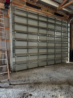 Hurricane rated commercial door - This door was installed after a micro burst removed this barn’s old slider.