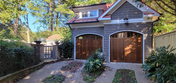 Garage Door Overhaul in Atlanta, GA - We love these faux wood tone overlay garage doors installed for a customer in Atlanta, GA. We overhauled their entire system, including both openers. Garage Door Overhaul in Atlanta, GA - We love these faux wood tone overlay garage doors installed for a customer in Atlanta, GA. We overhauled their entire system, including both openers.