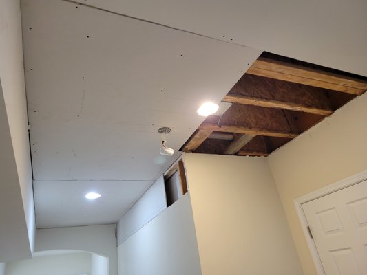 drywall repair - People had a leak from their upstairs bathroom. A mitigation company treated studs and we replaced drywall and painted affected areas.