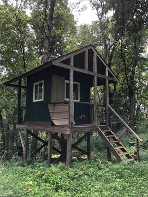 Sided this tree stand for a customer due to porcupines eating the wood. Customer choose to go with metal camouflage! - This tree stand was wrapped in medal siding due to porcupines eating the side of the wood which what it had previously. We wrapped this entire tree stand in camouflage medal siding to fix that problem!