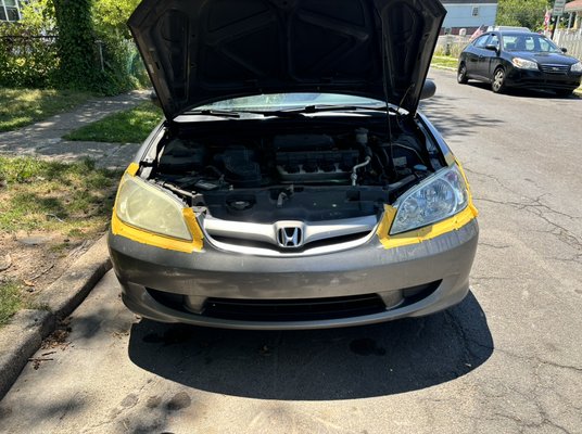 2004 Honda Civic Renewal - This customer initially hesitated about whether to proceed with the headlight restoration service, given that they had recently purchased new headlight bulbs. However, after a brief period of reconsideration, they were highly satisfied with the results, enabling them to fully utilize their recent upgrade! 2004 Honda Civic Renewal - This customer initially hesitated about whether to proceed with the headlight restoration service, given that they had recently purchased new headlight bulbs. However, after a brief period of reconsideration, they were highly satisfied with the results, enabling them to fully utilize their recent upgrade!