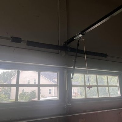 Garage Door - This garage door torsion spring broke. They could not open their garage door. We came out same day and replaced the garage door torsion spring and got them back operational with a warranty on parts and labor! Garage Door - This garage door torsion spring broke. They could not open their garage door. We came out same day and replaced the garage door torsion spring and got them back operational with a warranty on parts and labor!