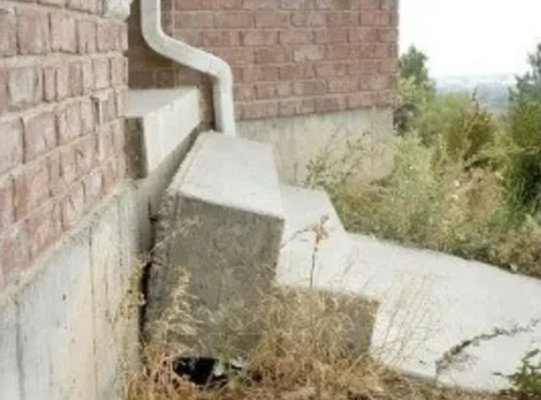 Concrete Leveling - At Minnesota Concrete Lifting, we recommend repairing any settling outdoor or indoor concrete by mudjacking the slab. This will fill any voids underneath the concrete while lifting the concrete up towards its original position. We provide both mudjacking and poly foam options.
This helps your concrete slab become functional and safe to use again. Your driveway, walkway or sidewalk will look as good as new and be able to support regular traffic on its surface. Mudjacking will also help the surface remain stable and structurally sound.
Concrete steps like those shown below can sink and tilt away from the house if the soil beneath the steps settles or gets washed away. This creates a safety hazard that needs to be corrected right away. Instead of replacing the stairs, a mudjacking repair can lift the concrete. Concrete Leveling - At Minnesota Concrete Lifting, we recommend repairing any settling outdoor or indoor concrete by mudjacking the slab. This will fill any voids underneath the concrete while lifting the concrete up towards its original position. We provide both mudjacking and poly foam options.
This helps your concrete slab become functional and safe to use again. Your driveway, walkway or sidewalk will look as good as new and be able to support regular traffic on its surface. Mudjacking will also help the surface remain stable and structurally sound.
Concrete steps like those shown below can sink and tilt away from the house if the soil beneath the steps settles or gets washed away. This creates a safety hazard that needs to be corrected right away. Instead of replacing the stairs, a mudjacking repair can lift the concrete.