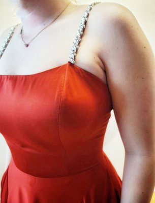 Custom Graduation Dress Design 2022 - My client had an idea in mind for a Graduation Dress as she had an issue with having dresses fit her bust and wanted to feel elegant in red satin. we designed a beautiful dress for her based on her description. We had the dress drawn out and fabric choice picked out by the second appointment.  By the 3rd appointment we had the dress fully done. 
With some minor touches she took the dress home by 4th appointment in 6 weeks from the first meeting.
