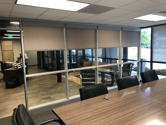 Commercial Lutron automatic shade install - A commercial space that needed some privacy. Lutron roller shades with a commercial architectural metal facia completed this automatic shade installation. With the push of a button, this conference room becomes a private letting space for those delicate times. When not required, the shades tuck completely away and allow a clear view. Commercial Lutron automatic shade install - A commercial space that needed some privacy. Lutron roller shades with a commercial architectural metal facia completed this automatic shade installation. With the push of a button, this conference room becomes a private letting space for those delicate times. When not required, the shades tuck completely away and allow a clear view.