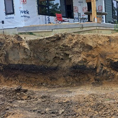 limestone retreat 2024 - Customer came to us they had steep bank behind the house that led down to a beautiful small stream they build a new house overlooking this s limestone retreat 2024 - Customer came to us they had steep bank behind the house that led down to a beautiful small stream they build a new house overlooking this s