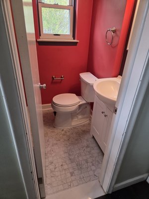 Half Bath Remodel - Another successful bathroom remodel. A small half bath had wood plank flooring that was falling apart. The customer opted for a beautiful small tile option and the result was a huge upgrade to the space! Installed a new toilet to round out the project.