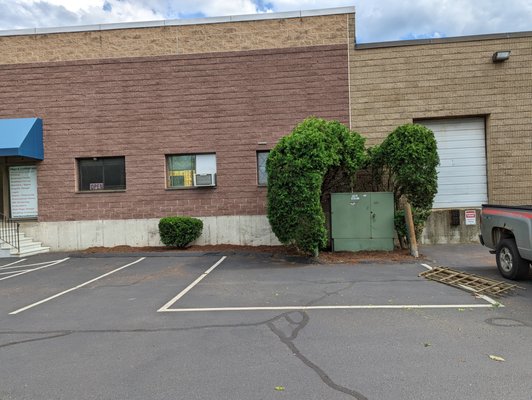 Landscaping, shrubs - Trimmed shrubs outside commercial building in Woburn, MA Landscaping, shrubs - Trimmed shrubs outside commercial building in Woburn, MA