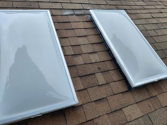 Skylight Replacement on Asphalt Shingle Roof - Replaced two leaking skylights on a shingle roof. Old units were removed, roof openings cleaned and prepped. Installed two new fixed skylights with proper waterproof flashing and sealed for long-term durability and leak prevention. Finished with matching shingles for a clean and professional result. Skylight Replacement on Asphalt Shingle Roof - Replaced two leaking skylights on a shingle roof. Old units were removed, roof openings cleaned and prepped. Installed two new fixed skylights with proper waterproof flashing and sealed for long-term durability and leak prevention. Finished with matching shingles for a clean and professional result.