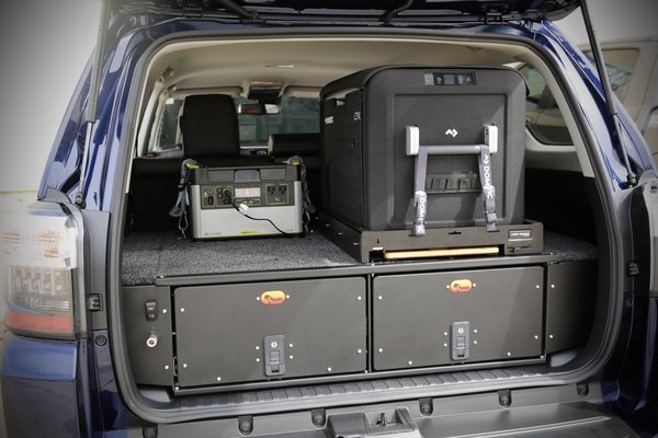 Vehicle Outfitting - Onboard Air & Drawer System - We recently wrapped up an awesome project that took this 2024 Toyota 4Runner to a whole new level of adventure-ready! 🏞️💥 We installed the powerful ARB dual air compressor, providing convenient tire inflation options with ports at both the front and rear. Whether you're airing up after hitting the trails or ensuring optimal tire pressure for smooth highway cruising, this setup has you covered! 🚗💨 

Plus, we integrated a sleek Big Country 4x4 drawer system, adding efficiency and organization to your gear storage needs. 🧳🔧 But wait, there's more! 🌟 On top of the drawer system, we installed a Front Runner fridge slide housing a Dometic fridge, all powered by the reliable Goal Zero power station. 🥶🔌 Say goodbye to soggy sandwiches and warm drinks—your refreshments stay chilled and ready for any adventure! 🏕️⛰️ 

With this setup, your 4Runner is not just a vehicle; it's a fully equipped adventure mobile, ready to take on any terrain and keep you comfortable along the way! 🌐🔥