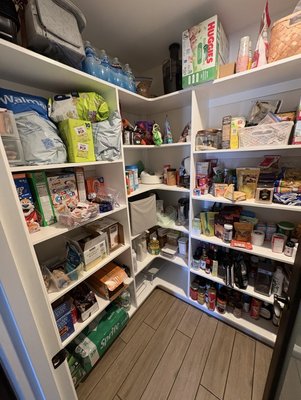 Pantry Organization - This pantry held items for a family of 5 and was very disorganized. By separating items into categories, and using bins and labels, we made this space functional for the whole family!