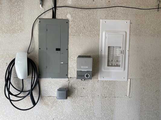 90 AMP Sub-Panel and Tesla Charger Install - Customer requested that we install a sub-panel and Tesla charger in their garage and the project turned out beautifully! 90 AMP Sub-Panel and Tesla Charger Install - Customer requested that we install a sub-panel and Tesla charger in their garage and the project turned out beautifully!