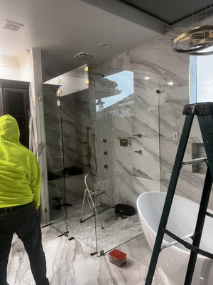 Frameless shower door installation 2022 - This frameless glass shower door was done in a remodeled restroom, where we took care of the prepping and installing the frameless door. We finished installing and our customer was very satisfied with the work done on her shower. Frameless shower door installation 2022 - This frameless glass shower door was done in a remodeled restroom, where we took care of the prepping and installing the frameless door. We finished installing and our customer was very satisfied with the work done on her shower.