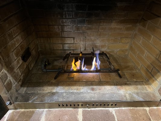 Fireplace conversion from gas to wood - A wood burning masonry fireplace had been converted by previous owners to gas burning. The new owners wanted to convert back to wood burning. The gas fire system was removed, fireplace was throughly cleaned and a new log lighter bar was installed to make lighting easy. Fireplace conversion from gas to wood - A wood burning masonry fireplace had been converted by previous owners to gas burning. The new owners wanted to convert back to wood burning. The gas fire system was removed, fireplace was throughly cleaned and a new log lighter bar was installed to make lighting easy.