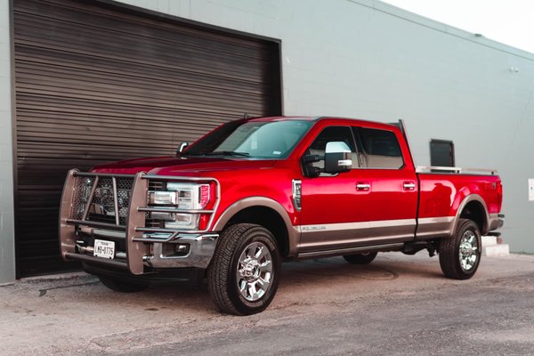 2018 Red Ford F350 - It's time to celebrate! And what better way to do that than with a shiny, spotless, and Clean Ford F350. Your friends have got you covered with a 2-step paint correction to make your truck as bright as the birthday balloons, a seal to keep the party going all year long, and a full interior detail to clean up after all the birthday cake crumbs. Book your appointment now and let's make your 2018 Ford F350 the birthday gift that keeps on giving! 2018 Red Ford F350 - It's time to celebrate! And what better way to do that than with a shiny, spotless, and Clean Ford F350. Your friends have got you covered with a 2-step paint correction to make your truck as bright as the birthday balloons, a seal to keep the party going all year long, and a full interior detail to clean up after all the birthday cake crumbs. Book your appointment now and let's make your 2018 Ford F350 the birthday gift that keeps on giving!