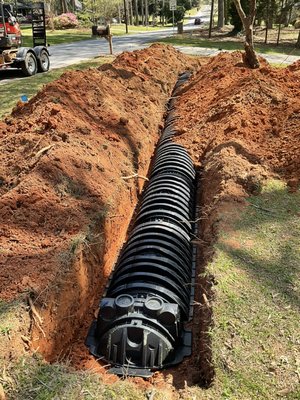 Drain field install - This is a new 1000 gallon tank with 196’ of hi capacity chambers. (Drain field)