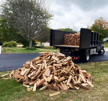 Firewood Deliveries - Our professional customer service team makes ordering firewood simple and stress-free. Uncertain about what to order? We’d be happy to answer any questions you have about our firewood and walk you through the ordering process. You can schedule and pay for your firewood delivery in a five-minute phone call!

You will receive an estimated arrival time for your order, and we’ll keep you updated if there are any schedule changes. Our professional driver will arrive on time and deliver your wood to the exact spot you requested. We encourage you to be as specific as you want when telling us where to leave your wood, and we’ll follow your directions to a T. We can also stack your wood for you for an additional fee.