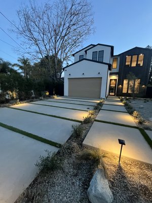 Woodland Hills project . - This front and back yard was a complete model . The house was demoed and redone . Some the hardscape was upgraded to a modern look . Customer was very happy by the outcome of this project . Woodland Hills project . - This front and back yard was a complete model . The house was demoed and redone . Some the hardscape was upgraded to a modern look . Customer was very happy by the outcome of this project .