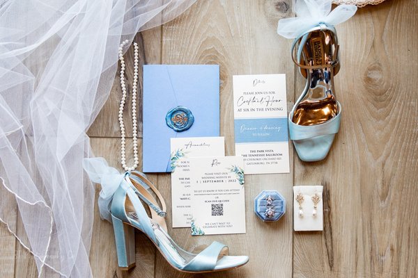 Mandy and Gabe Wedding - This custom-designed wedding stationery featured an elegant blue and white floral theme. From the invitation suite to the welcome sign, timeline, and seating chart, every detail came together seamlessly. Discover more about this beautiful celebration and its cohesive design → https://chelseyhuffdesign.com/blog/mandy-gabe-the-park-vista-hotel/