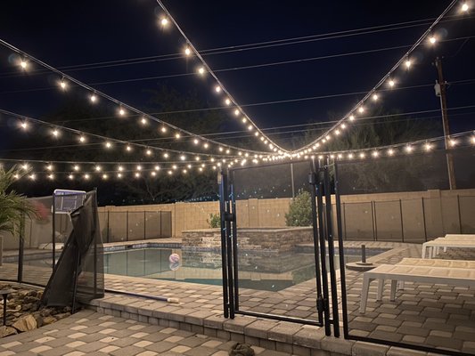 Bistro & String Lighting - Let us design and install your bistro lighting project the right way. Smart app controlled dimming and time schedule technology. Custom fabricated steel posts with fade resistant powder coating.