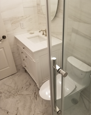 "Bath remodel 2020" - This remodel was done in Clayton, required gutting the existing bathroom to accommodate a complete change over from top to bottom. We installed a prefabricated shower pan, and used "GoBoard membrane" for waterproofing material. We placed wall to wall marble, and did marble flooring as well, sealing before and after install. We used high end fixtures like Toto toilet and Hansgrohe for the water valves. It came out beautifully. "Bath remodel 2020" - This remodel was done in Clayton, required gutting the existing bathroom to accommodate a complete change over from top to bottom. We installed a prefabricated shower pan, and used "GoBoard membrane" for waterproofing material. We placed wall to wall marble, and did marble flooring as well, sealing before and after install. We used high end fixtures like Toto toilet and Hansgrohe for the water valves. It came out beautifully.