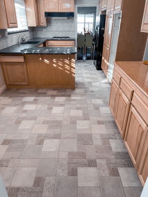 Kitchen Floor Tile Replacement Project - Kitchen Floor Tile Replacement Project
Revamping a kitchen often starts from the ground up, and that's precisely what I embarked on with this project. Here's my journey:
Assessment & Consultation: I started by understanding the client's vision and carefully assessing the current floor condition.
Tile Removal: I carefully chiseled out the old tiles, ensuring the underlying surface remained intact.
Surface Preparation: A thorough cleaning and leveling were essential to guarantee a smooth base for the new tiles.
Tile Selection: Working closely with the client, I helped pick tiles that would seamlessly blend with the kitchen's aesthetics.
Tile Installation: I meticulously laid precision-cut tiles in a pattern that would enhance the kitchen's overall look.
Grouting: Once the tiles were set, I filled the gaps with high-quality grout for durability and a polished appearance.
Sealing & Finish: I applied a final protective layer to make future maintenance easier and keep the tiles stain-free.
Post-Installation Inspection: Finally, I personally inspected every inch of the floor to ensure perfection.
The outcome? A stunning and functional kitchen floor that I'm incredibly proud of. Kitchen Floor Tile Replacement Project - Kitchen Floor Tile Replacement Project
Revamping a kitchen often starts from the ground up, and that's precisely what I embarked on with this project. Here's my journey:
Assessment & Consultation: I started by understanding the client's vision and carefully assessing the current floor condition.
Tile Removal: I carefully chiseled out the old tiles, ensuring the underlying surface remained intact.
Surface Preparation: A thorough cleaning and leveling were essential to guarantee a smooth base for the new tiles.
Tile Selection: Working closely with the client, I helped pick tiles that would seamlessly blend with the kitchen's aesthetics.
Tile Installation: I meticulously laid precision-cut tiles in a pattern that would enhance the kitchen's overall look.
Grouting: Once the tiles were set, I filled the gaps with high-quality grout for durability and a polished appearance.
Sealing & Finish: I applied a final protective layer to make future maintenance easier and keep the tiles stain-free.
Post-Installation Inspection: Finally, I personally inspected every inch of the floor to ensure perfection.
The outcome? A stunning and functional kitchen floor that I'm incredibly proud of.