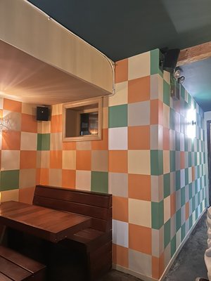 Painting of a nook and wall in a checkered pattern - This process was first put together digitally by getting the exact measurements of the space, and creating a mockup on a flat canvas so we could properly assess how to transition from one color to another without any areas looking too busy or overcrowded. We then taped up all inner triangles using lazers to make exact measurements, and after 3-4 rounds of taping and painting were able to create this lovely gradient for a client! Painting of a nook and wall in a checkered pattern - This process was first put together digitally by getting the exact measurements of the space, and creating a mockup on a flat canvas so we could properly assess how to transition from one color to another without any areas looking too busy or overcrowded. We then taped up all inner triangles using lazers to make exact measurements, and after 3-4 rounds of taping and painting were able to create this lovely gradient for a client!