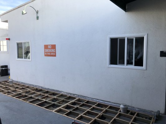 Commercial Bldg - Cut an opening in the side of bldg to install some windows in office areas. Repaired stucco on outside and drywall on interior side and painted to match existing.