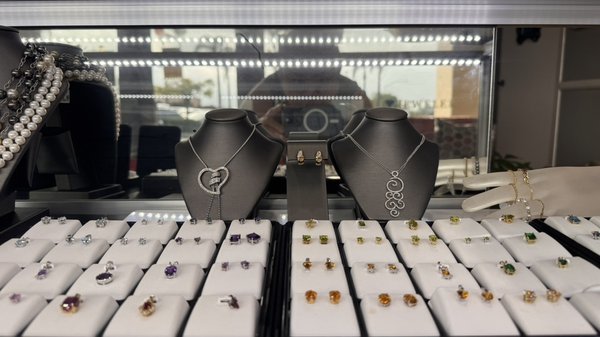 Jewelry - Our collection features 14k gold, sterling silver, and natural gemstones, offering something for every style whether you’re looking for timeless classics, bold statement pieces, or sentimental designs. From delicate everyday wear to eye-catching sets, each item is selected with attention to quality, shine, and wearability.
You’ll find:
• Diamond and gemstone earrings in a range of sizes and settings
• Custom and ready-to-wear rings, from minimalist bands to intricate designs
• Layered pearl and beaded necklaces that bring texture and elegance
• Gold pendants and charms, including religious, symbolic, and fashion-forward styles Jewelry - Our collection features 14k gold, sterling silver, and natural gemstones, offering something for every style whether you’re looking for timeless classics, bold statement pieces, or sentimental designs. From delicate everyday wear to eye-catching sets, each item is selected with attention to quality, shine, and wearability.
You’ll find:
• Diamond and gemstone earrings in a range of sizes and settings
• Custom and ready-to-wear rings, from minimalist bands to intricate designs
• Layered pearl and beaded necklaces that bring texture and elegance
• Gold pendants and charms, including religious, symbolic, and fashion-forward styles