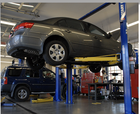 Full Service Vehicle Repair Center - Services Performed
Remove and reinstall four wheels and rear brake drums to inspect brake condition. Inspect entire system for leaks. Lining remaining is: Front ( %) Rear ( %)
Replace front brake pad linings and front brake disc rotors. Clean and lubricate brake calipers and slide mechanisms. Check and fill brake fluid. Bleed air from system. Road test vehicle.