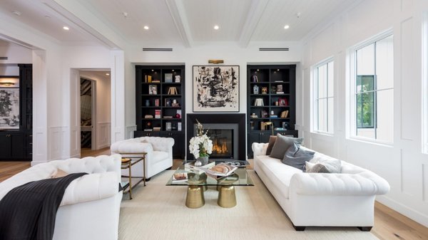 Complete Home Remodel: McCormick Project - A modern and luxurious refresh to this home featuring marble, fresh white cabinetry + wood paneling, and gold accents to bring our client's dream home to life.